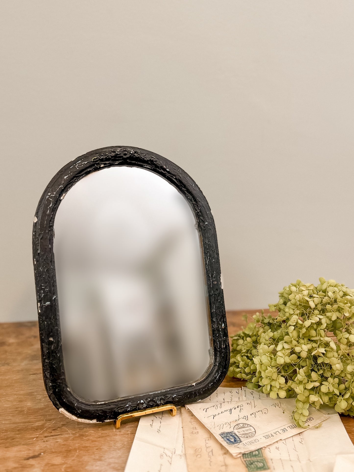 Chippy Arched Mirror with Floral Accents
