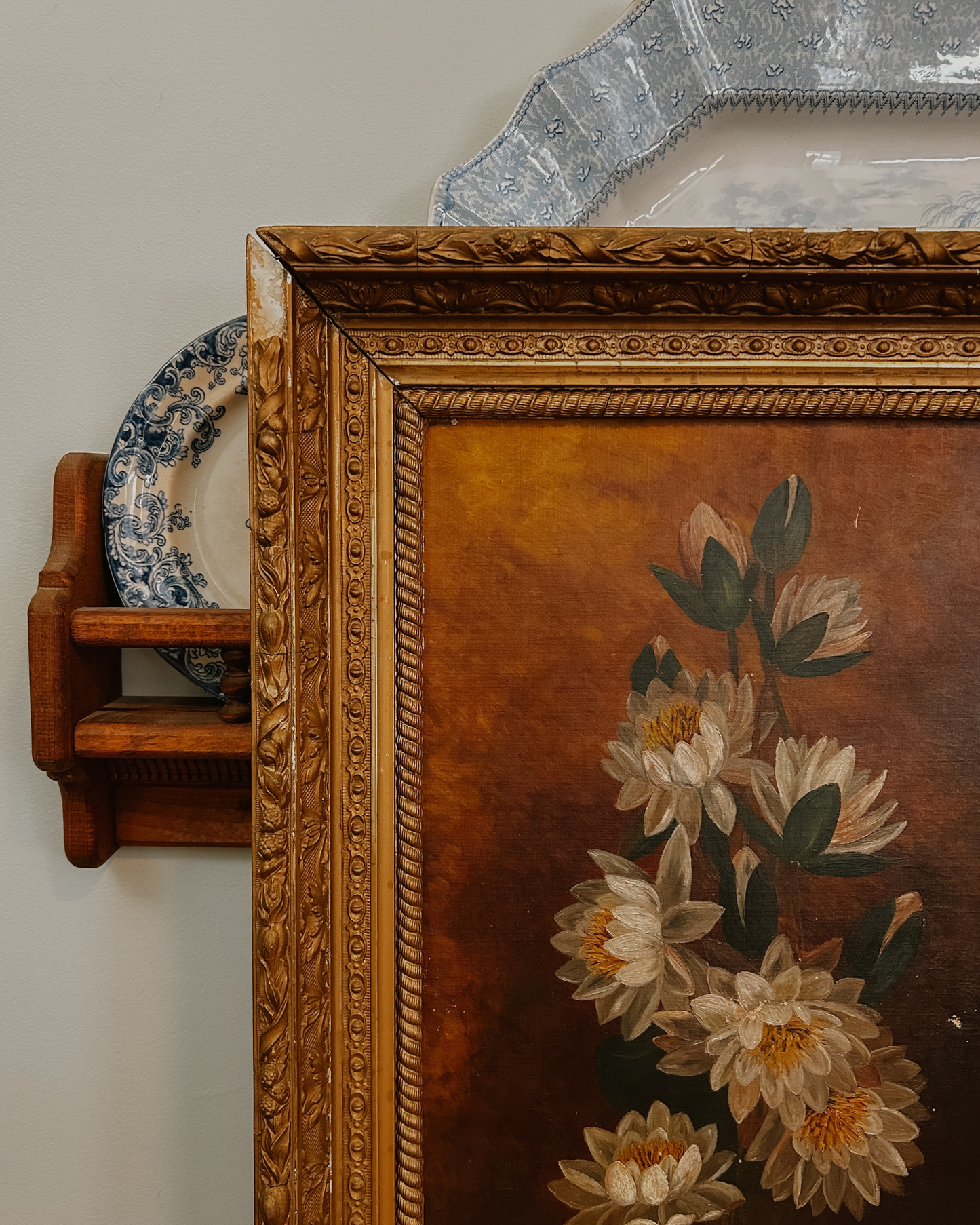 19th Century oil on canvas depicting a vertical cluster of white water lilies