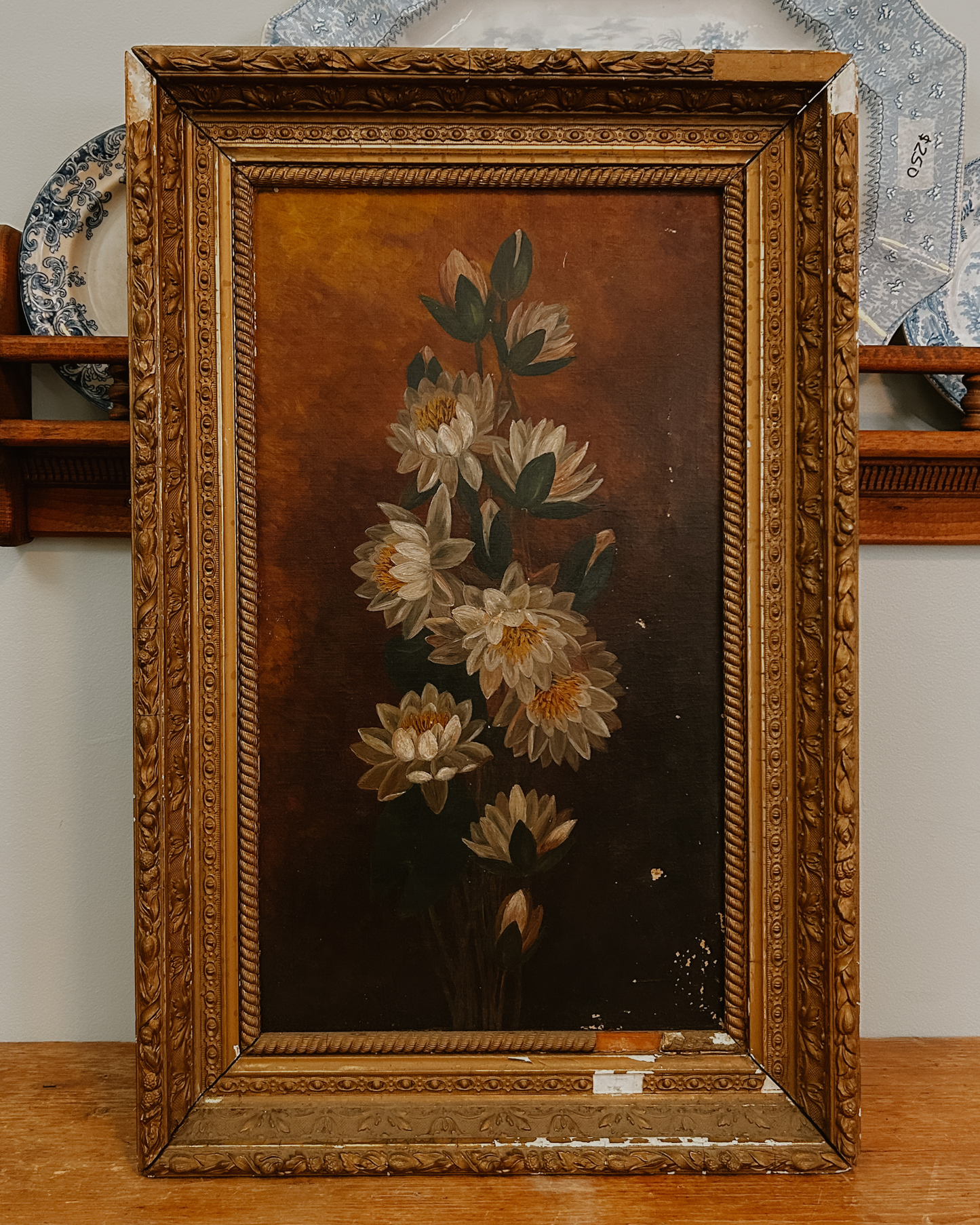 19th Century oil on canvas depicting a vertical cluster of white water lilies