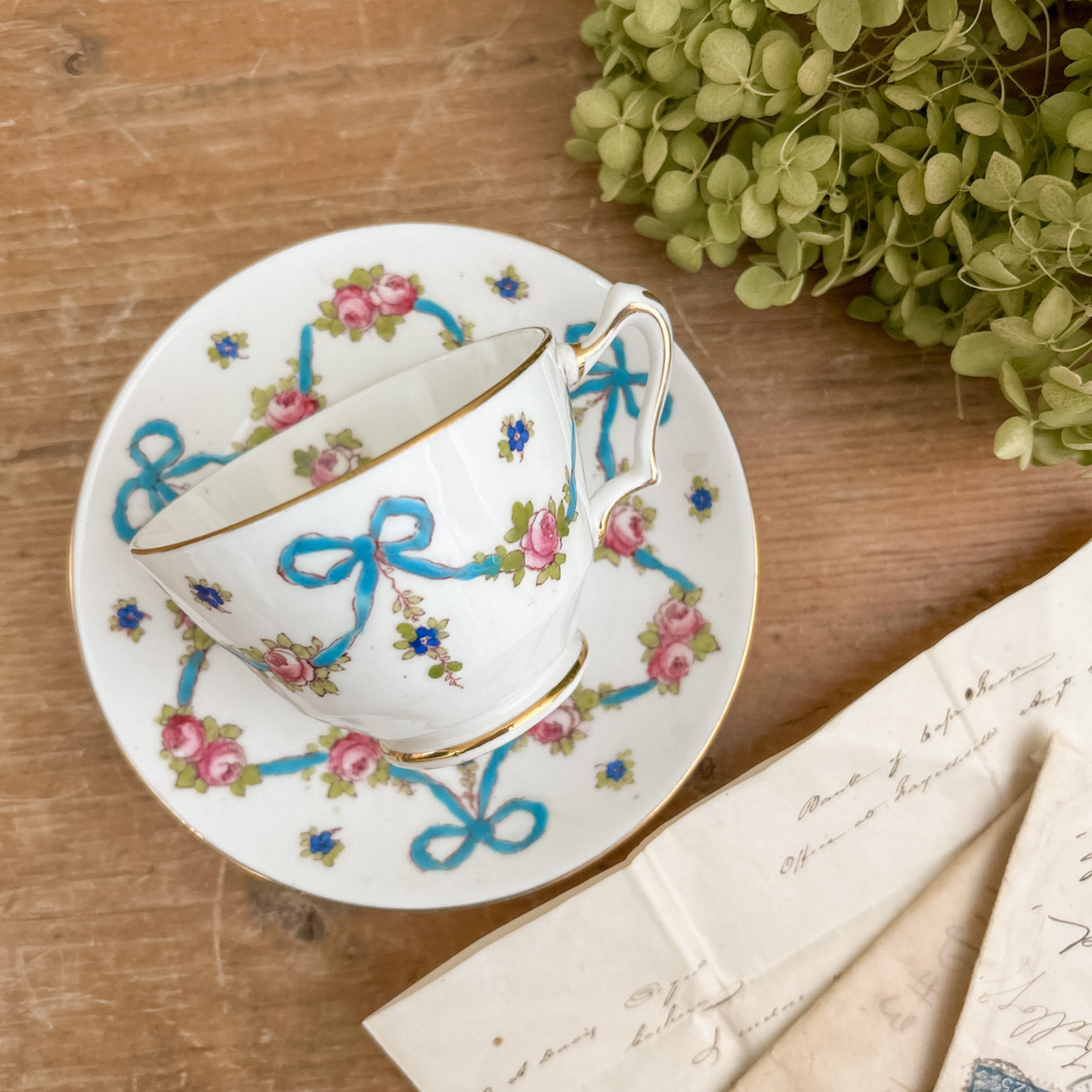 Staffordshire Fine Bone China Ribbon & Rose Teacup and Saucer