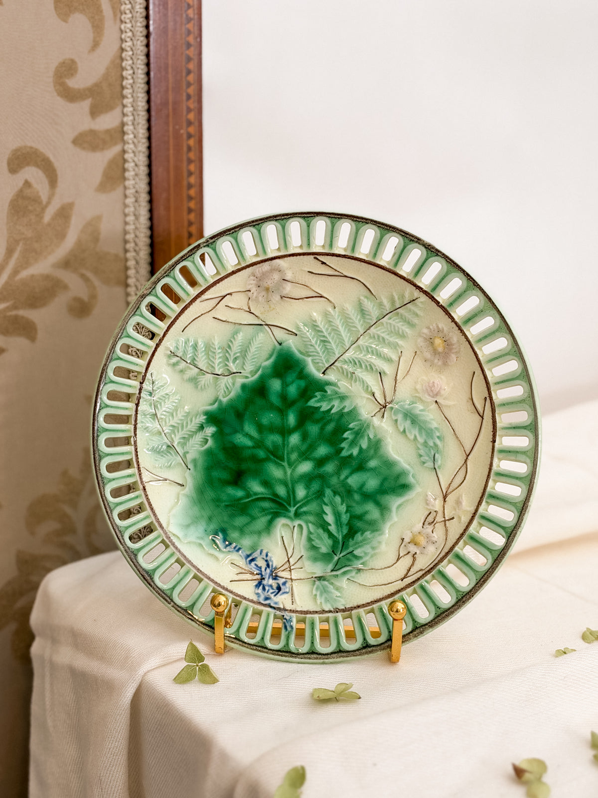 Antique majolica plate with reticulated rim