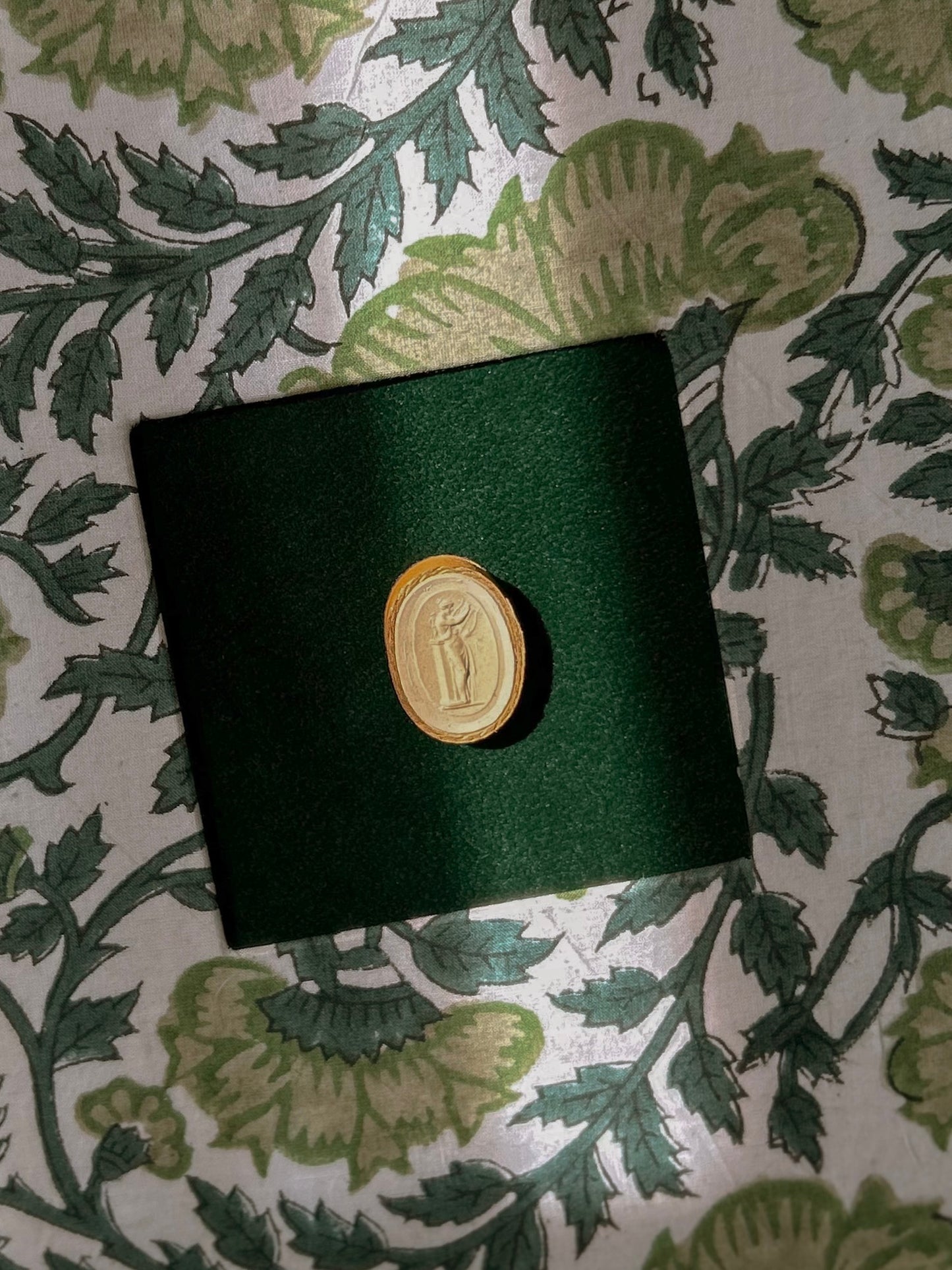 Set of Four Antique Grand Tour Intaglios on Bespoke Framed Botanical Fabric