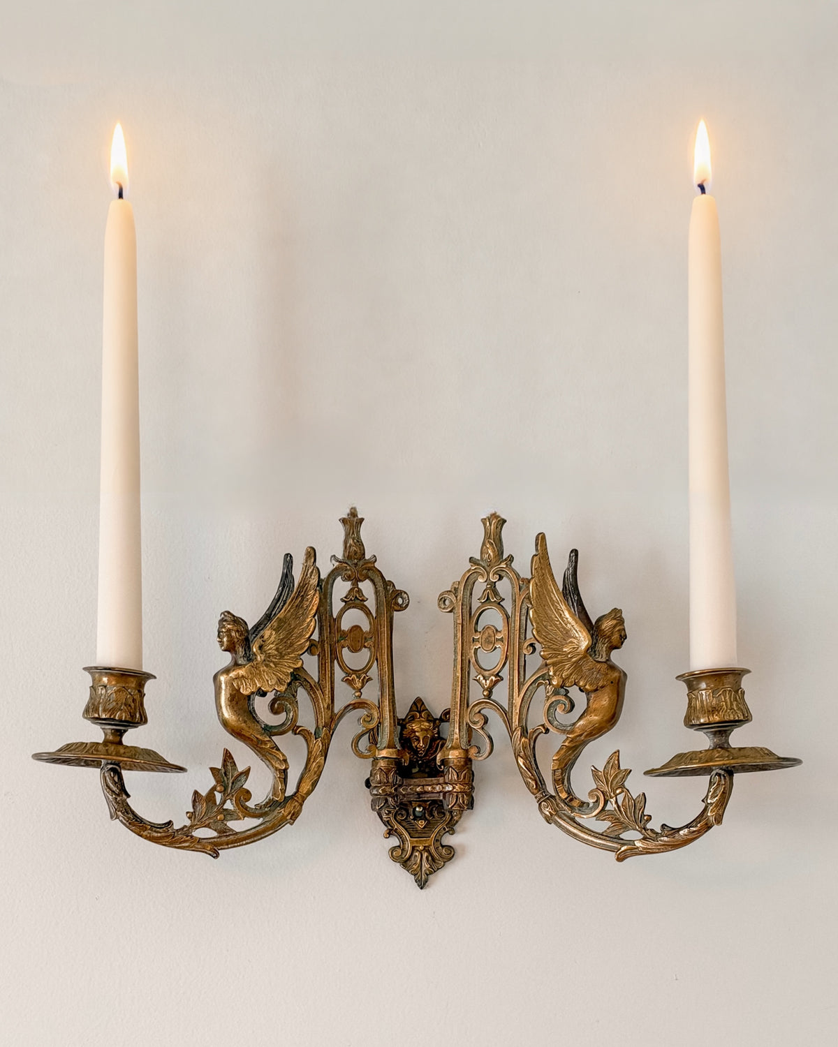 Pair of Antique Bronze Swing Arm Sconces